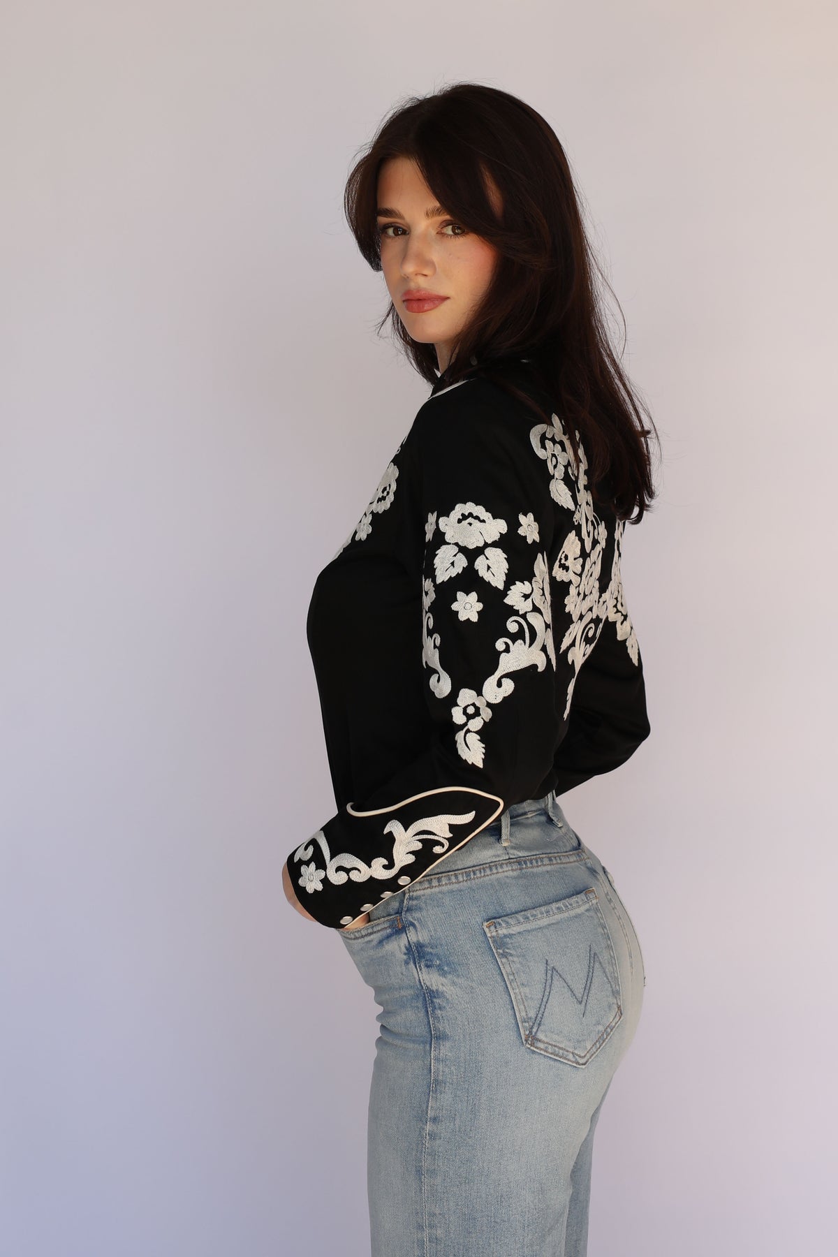 Waist-up view of the H Bar C Fort Worth women's black embroidered western shirt, vintage western wear.