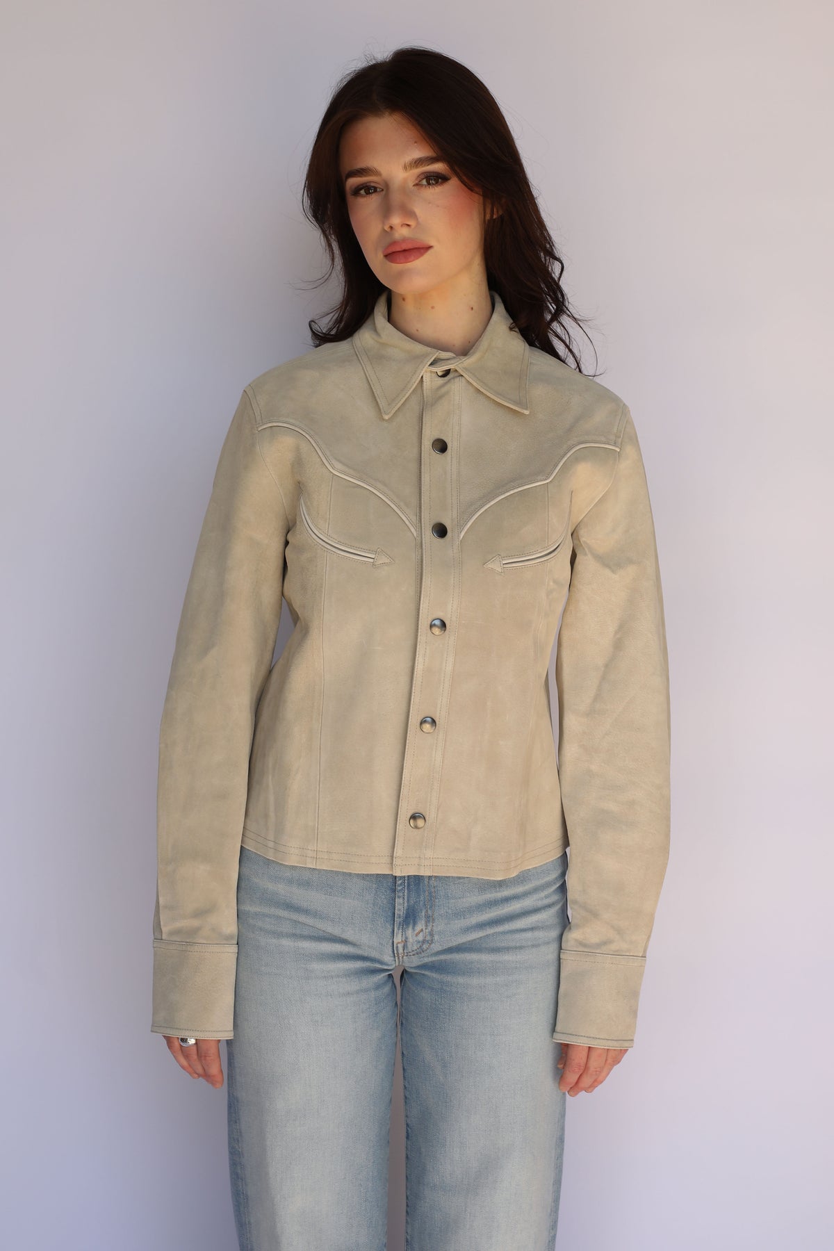 Front view of the H Bar C Austin stone western jacket on a female model, vintage western wear.