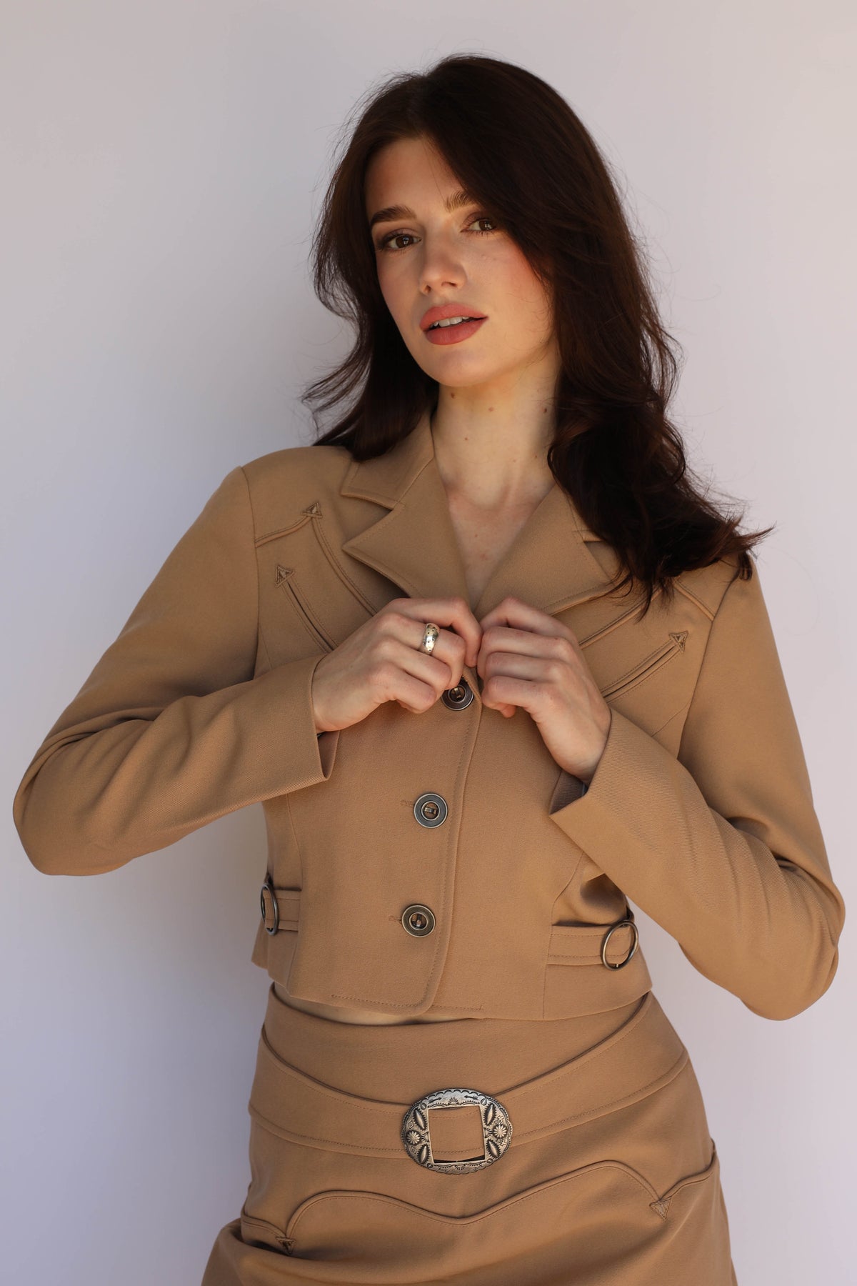 Waist-up view of the H Bar C Raleigh tan western jacket with piped arrow pockets, vintage inspired western wear.