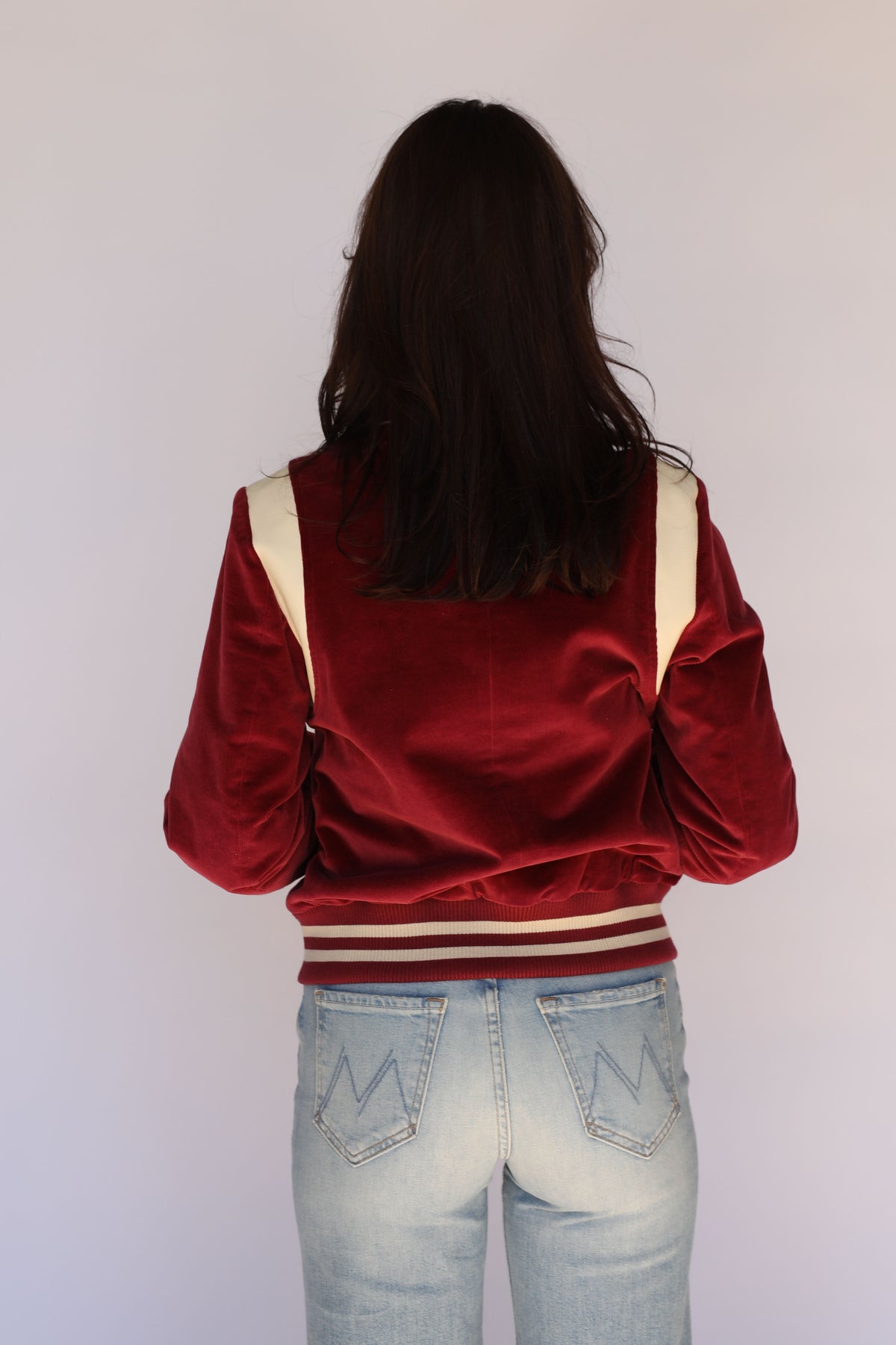 Woman wearing the Silver Lake Corduroy Unisex Jacket in maroon