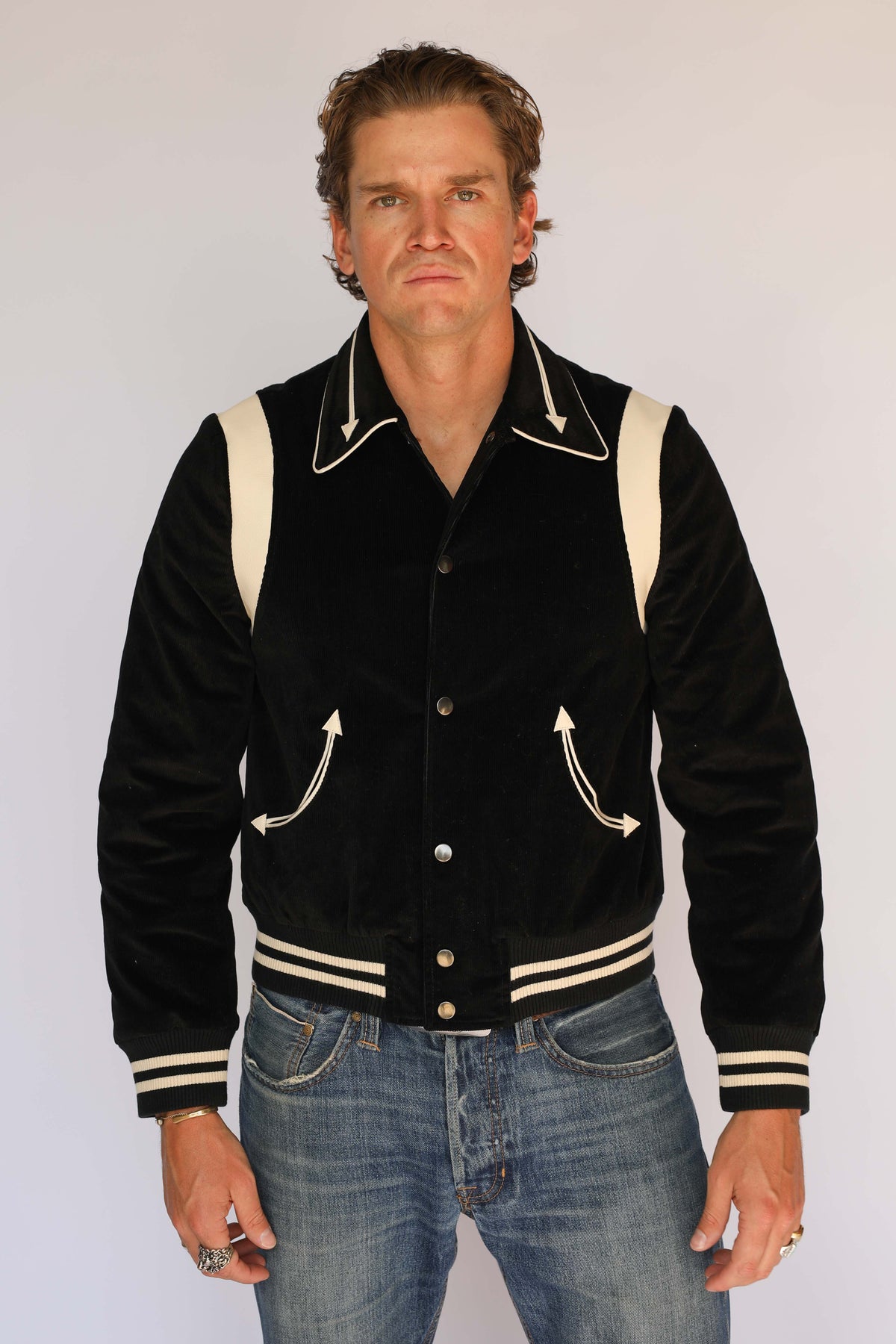 H Bar C Silver Lake black corduroy western jacket worn with blue jeans and a silver buckle, 1950s style vintage western wear.