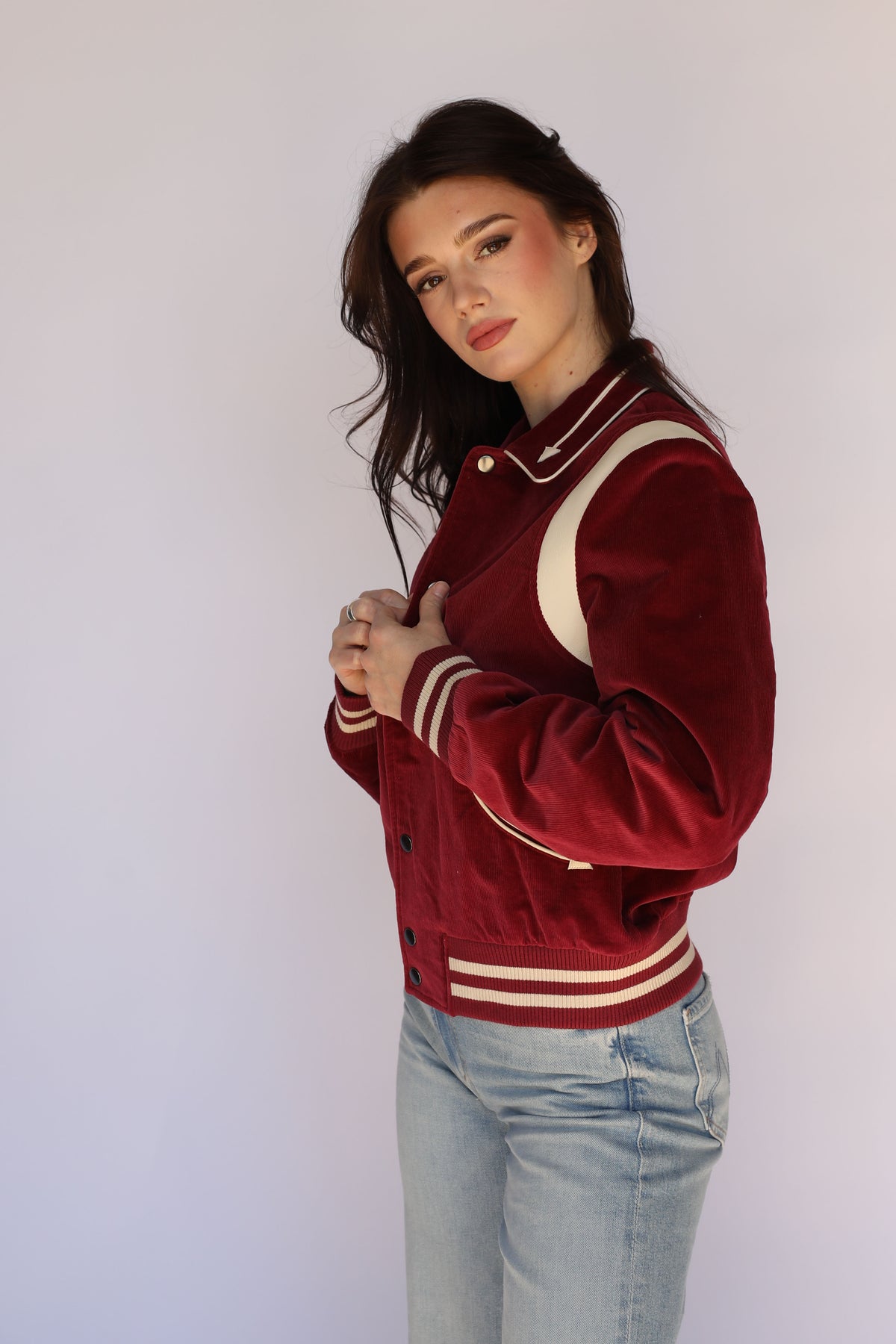 Woman wearing the Silver Lake Corduroy Unisex Jacket in maroon