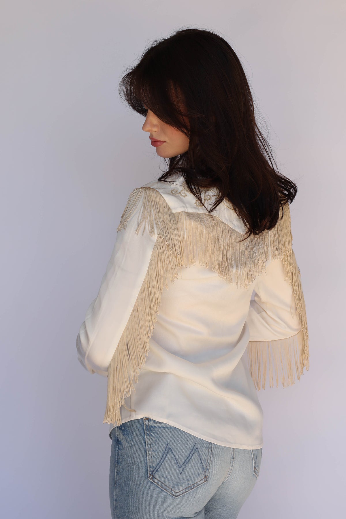 Model in the H Bar C Taos women's white western shirt with fringed yoke, vintage western wear.